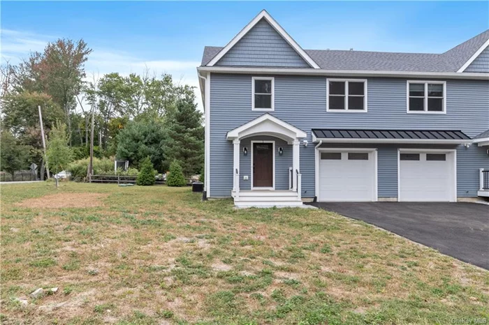 Welcome to 65 Paulding Lane, a stunning new rental in Crompond, NY. Brand new 2024 construction featuring three spacious bedrooms and two and a half baths across 1, 802 square feet. The open-concept eat-in kitchen features stainless steel appliances and a generous pantry, seamlessly connecting to the living areas. The primary suite includes a completed outfitted walk-in closet and a luxurious en-suite bath. Two additional bedrooms and a dedicated laundry area with brand new Samsung washer/dryer provide comfort and convenience. Set on a spacious lot, the tenant can enjoy the side property for entertaining. This home includes a one car attached garage, additional driveway parking, unfinished full basement, and attic for ample storage. Brand new central air, forced air heating, and hardwood floors. Conveniently located near highways, schools, shopping including the Cortlandt Town Center and many more.