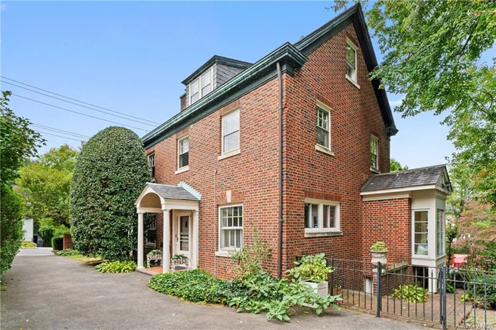 Handsome brick Colonial, ideally located adjacent to Bronxville Village.  Very private as the house is sited sideways on the lot. This home is rich with architectural character and offers comfortable rooms with lovely proportions. Classic layout. Gas fireplace that opens into both the living room and sunroom. Formal Dining room. Charming kitchen with breakfast nook overlooking the yard. Primary bedroom with bath. Two bedrooms and a hall bath complete the second floor. A home office and the fourth bedroom round out the third floor. Central air conditioning. Full unfinished basement. Detached two car garage. Private yard. A premier walk to all location. 28 minute commute to NYC via Metro North. This home is a gem just waiting to welcome its new owners!