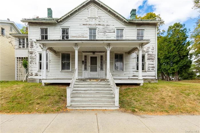 Rare Village of Red Hook renovation opportunity. Circa 1900 farmhouse loaded with character and charm. Includes original finishes such as hardwood floors & ornate staircase. Attractive floor plan includes formal dining room, formal living room, spacious kitchen w/huge walk-in pantry & full bathroom on main level. Four well proportioned bedrooms, full bath and sunroom on second floor. Full walk-up attic for future finished space or abundant storage. Impressive curb appeal with large front porch & metal roof. Enjoy the conveniences of municipal water & sewer. Bring your vision and transform this home to its former glory while incorporating modern finishes and amenities. Sold as-is. Cash offers only.