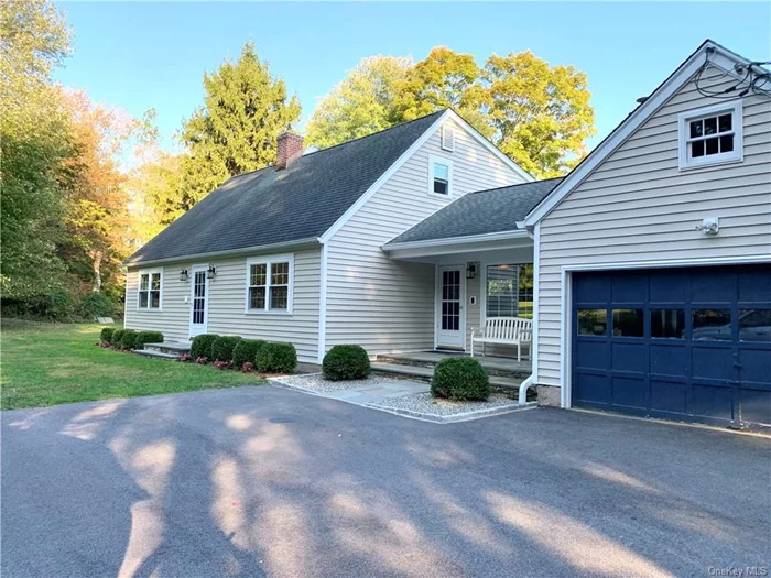 Nestled at the end of a cul de sac in a picturesque neighborhood, this expanded Cape Cod stye home exudes character and charm. Featuring 3 spacious bedrooms, one with a sitting room, 3.5 bathrooms, an office, and first floor laundry, this home provides plenty of space for everyone. The updated eat-in kitchen, offers stainless steel appliances, sliders to the new deck, a wood burning fireplace and built in shelving making it ideal for meal prep as well as entertaining or intimate gatherings. The home&rsquo;s layout flows seamlessly into a dining room or through an arched hallway leading to the office, powder room with laundry, well proportioned living room with a second fireplace and the first of 2 primary bedrooms. This first floor suite consists of a nicely sized bedroom, a walk in closet and a beautifully appointed bathroom. Up the stairs, you will find two additional bedrooms, one with a sitting area , walk in closet and ensuite, as well as the 3rd full bath. The incredible surrounding property boasts mature plantings, wonderful stone walls, gorgeous open views and a possible pool site.