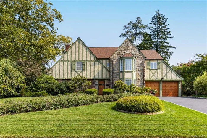 This 1936 Elegant Tudor has curb appeal like no other, perhaps the best lawn in town! Situated on a beautiful landscaped to perfection lot in the desirable Strathmore community. The blend of classic charm with modern updates is impressive. The recent renovations not only preserved the home&rsquo;s architectural integrity but also made it eco-friendly with the Unico HVAC system and high-efficiency Bryant unit, Double-pane ENERGY STAR windows are a great touch for energy savings and comfort. The kitchen was remodeled , and the finished lower level has a wet bar plus a new powder room, perfect home office. The stunning backyard takes you to a Paris secret garden , maintenance free pea gravel , a brick privacy wall and the most beautiful evergreens... sellers have entertained up to 50 people for summer gatherings! With updated and new bathrooms, refinished wood floors, and a freshly painted interior, this home is ready for its next chapter. Walk to Scarsdale Train and village. Bicycle Sundays on the Bronx River Parkway. Close to private school and public schools, buses provided. Star is not included in the property taxes. The listed square footage includes the legal finished basement of approximately 950.