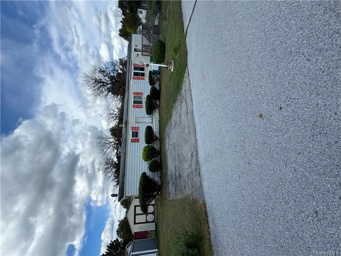 Very nice Corner Lot! Mobile Home! 2 BR, 1 bath, living room, kitchen, Laundry in the bathroom HOA includes Taxes, Hot Water, Garbage, Snow.