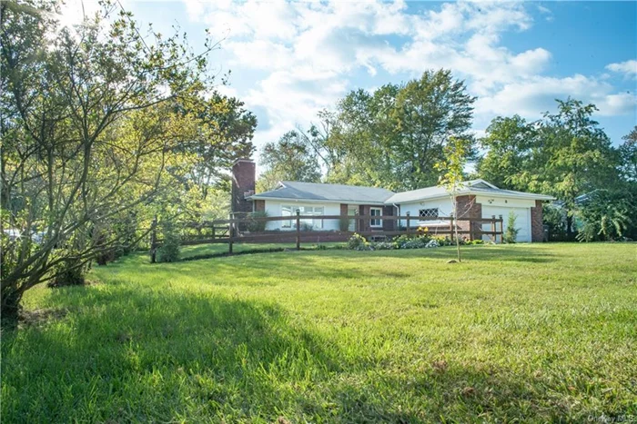 This unique Mid-Century Retro home is bright, charming, & spacious. New porcelain checkered tile honors the retro style of the eat-in kitchen with brand-new Quartz countertops, 36in: cooktop, dishwasher, & ceramic sinks. The kitchen includes a large walk-in pantry and an attached laundry room w/ a walk-out to the deck, perfect for entertaining and watching the sunset with family & friends. The dining/living room is an open space w/ banquette seating, a large fireplace w/ built-in shelving, & a picture window that invites natural light all day. W/ new upstairs windows, hardwood floors throughout, 3 large bedrooms, 2 full baths, ample closet space, a large walk-out basement/storage, newly fenced in front yard, 2-car garage, new septic 2022, situated on 0.50 acres on the Danbury/New Fairfield border, this 1950&rsquo;s home is beyond delightful, with endless possibilities. Close to grocery, restaurants, Starbucks, hiking trails, Marjorie Lake with reservoir winter views, and 6 miles to I-84.