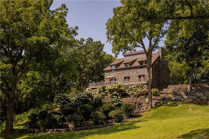 The epitome of waterfront living at 567 4-Mile Point Road in Athens, NY. This four-bedroom, three-and-a-half-bathroom post and beam home offers unparalleled luxury, privacy, and stunning views of the Hudson River. Nestled at the end of a scenic and quiet road, the property abuts state land and a bird sanctuary. The interior of this home is a masterpiece of design, exemplifying the elegance of post and beam construction. The main level features radiant heated stone floors quarried in South Africa. A striking floor-to-ceiling stone fireplace creating a grand ambiance. Adjacent to the living space is a formal dining area with two sets of French doors opening onto an expansive deck, flooding the home with natural light and providing breathtaking sunrise views of the Hudson River. Opposite the fireplace, a gourmet kitchen that is a chef&rsquo;s dream. It&rsquo;s equipped with top-of-the-line appliances, a sleek new Invisicook countertop, custom cabinetry, and pantry offers ample storage and aesthetic appeal. The second floor of the home offers a primary suite featuring a spacious bathroom and fireplace that adds warmth and elegance. In addition, two bedrooms with river views and a guest bath. The crowning feature, the third-floor crow&rsquo;s nest with 360-degree views. The lower level includes an additional living space, full bathroom, a large bedroom room or office space, and french doors leading out to a covered patio and grounds. Once outside you discover a private fenced oasis. Tiered massive stonewalls surrounded by mature flowering trees, a waterfront peninsula, and a breathtaking fountain with a cascading waterfall. This stunning feature has the potential to be transformed into a luxurious pool by the next owner, offering endless possibilities for outdoor enjoyment. The property boasts plenty of waterfront for the future owner to dock or moor a boat. Located a short distance from Hudson, Albany, Saratoga Springs, and the Catskill Mountains, offering cultural, dining, shopping, and outdoor activities aplenty. Commuters will find the location convenient, with the Amtrak station in Hudson offering service to NYC. Private airports in the region also support air travel, and New York City is just over two hours away by car, balancing rural peace with urban accessibility.