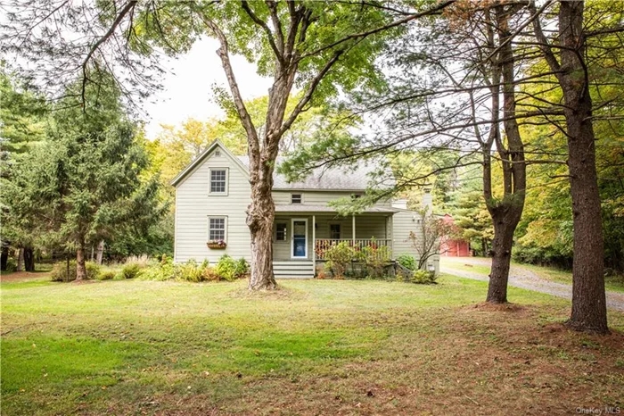 Welcome to Thornhill Farmhouse, an idyllic hideaway set on nearly three acres of private pasture and woodland. Thoughtfully modernized while retaining its circa 1830s post-and-beam charm, the home features a sun-filled living, dining, and kitchen area anchored by a wood-burning stove perfect for cozy evenings. The spiral staircase leads to an open workspace, bathroom, and spacious primary bedroom. Outdoors, enjoy peaceful views from two porches, stroll through established gardens, or relax in the screened-in gazebo. With an original, iconic red barn offering endless possibilities, and a successful short-term rental history, Thornhill Farmhouse is both a peaceful countryside getaway and a smart investment opportunity.