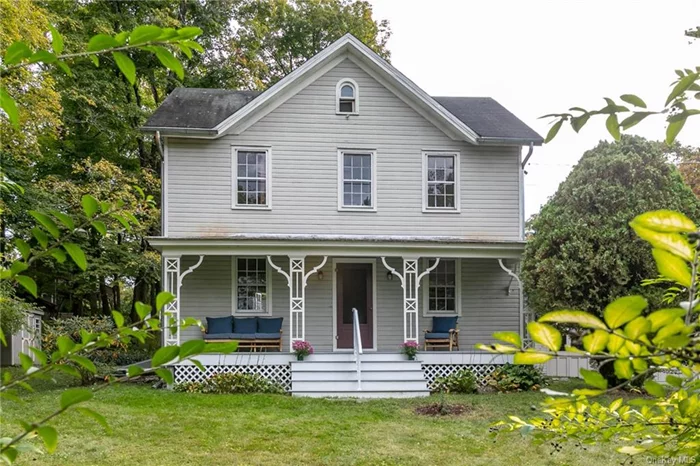 This c1880 folk Victorian in the historic hamlet of Rhinecliff is available for the first time in over 25 years. The home features 3 bedrooms and 1.5 baths. The setting is private with mature landscaping and large hedges that form natural borders. The house has been carefully restored by local craftspeople with handmade moldings and staircases while retaining many original details: gleaming wood floors, wavy glass windows, novelty siding and arched attic windows. The walk up attic allows for plenty of storage and potential for more finished living space. Outdoor spaces include a large back patio and full length rocking chair front porch. There is a newer, oversized 2+ car garage and an Amish built garden shed. A sweet, recently restored studio/playhouse has arched windows and new roof and floor; ready for you to create a your own art, yoga, or work space. Just a 5 minute walk to the Amtrak station and the Hudson River and quick drive into Village of Rhinebeck. Agent owned.