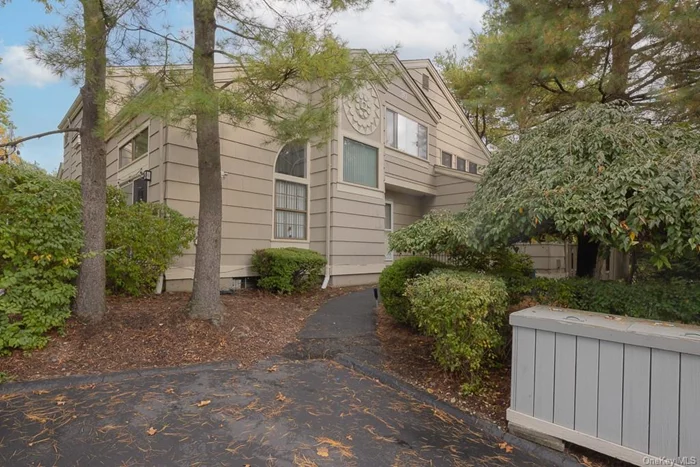 Don&rsquo;t miss out on this stunning, sun-drenched end unit tri-level townhouse style condo (no one above or below you) in the highly rated Clarkstown school district, located in the Treetops section of The Hamlets. This spacious 1-bedroom plus finished lower level, 2.1-bath home features a flexible, open floor plan with an updated kitchen, a large dining area that flows into the living room, with dramatic cathedral ceilings, and sliders leading to a private patio overlooking a grassy area. Upstairs, you&rsquo;ll find a generous master bedroom suite complete with a private full bath and ample space for additional closets or a home office (currently utilized as a nursery). The lower level offers even more living space, including a family room, den, and laundry area. Enjoy the convenience of two assigned parking spaces and a wealth of community amenities, including a pool, clubhouse, tennis courts, basketball, handball, and a playground. The NYC bus stops right in the complex, and there&rsquo;s easy access to highways and shopping. Taxes are just $6, 938.94, with a basic STAR rebate of $908.00.  Sq footage is approximately 1, 297 as per attached floor pan. Don&rsquo;t wait!