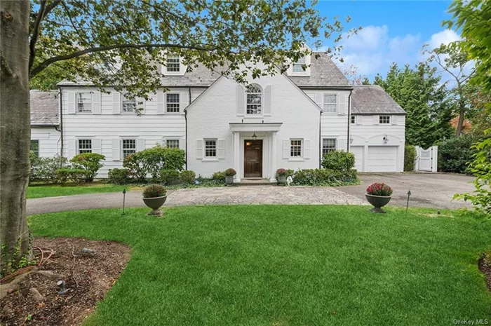 Welcome to 352 Pondfield Road! This 1929 Center Hall Colonial with slate roof has charming details throughout its impressive 4, 795 sq ft interior & inviting curb appeal. The chef&rsquo;s kitchen includes a generous center island with SS appliances with back staircase. It adjoins a formal dining room with built in China cabinets, massive living room oversize fireplace & Paneled Den with built in bookshelves The elegant 3 story staircase leads to the primary bedroom, dressing room, bath & WIC- 6 additional bedrooms & 4 additional baths. Lower level speakeasy includes wet bar & fireplace. Its backyard retreat sits on .40 acres of level property that combines mature specimen trees, oversize blue stone patio & sitting walls created by Landscape designer Renee Byers includes a built in BBQ, sound system, underground sprinkler system & Invisible fence. only 28 minutes to midtown!