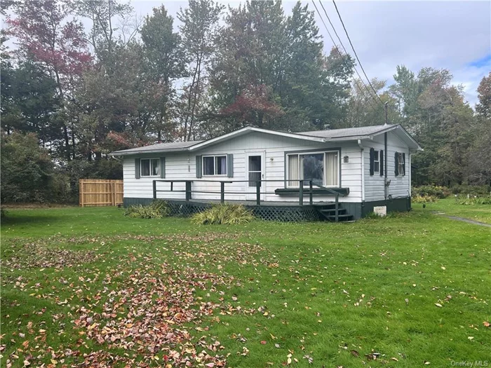 Well maintained move in ready double wide mobile home on a 1.18 acre parcel located on a beautiful country road in the town of Bethel. The home features 3 bedrooms, 1 bath, a bonus room with a woodburning stove and a 2-car detached garage. The property is conveniently located only a few minutes&rsquo; drive to Jeffersonville and Bethel Woods Center for the Arts.