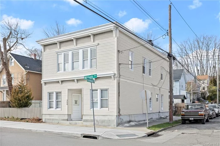 Legal 3 Family in Commerical C1 zone Corner 50X100 Lot , 1st Floor Left 1 bedroom currently rented @$2100 , Right Side 1 bedroom Rented @ $2000. 2nd Floor 7 Room 3 bedroom w/ Den currently rented @ $3500 . Recent 2023 renovations include 2 new kitchens & 2 new baths ; 2024 New Rubber Roof Replaced 5/2024 . Corner lot with Side yard could be ideal for parking . Detached Extra High 2 car Heated Garage w/ 2 Outdoor Parking spaces .