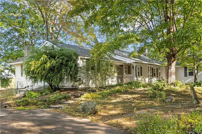 This well kept, one story, Ranch is situated well off the road in the middle of 4.7 acres. You are surrounded by protected land. The views to the West are of rolling fields and the Catskill Mountains beyond. To the East you see your front gardens and Mature trees. All rooms have hardwood Oak floors except the Bathrooms which are tile. The Kitchen and Primary Bath are recently completely renovated. It&rsquo;s a short walk to the center of the Village of Red Hook.