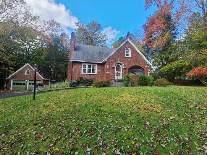 This adorable home radiates country charm! Elegant 1950&rsquo;s cape has been lovingly maintained for years. Many surprises await you as you enter through the arched wooden door of this brick beauty to a warm and inviting living space. Interior features include wood floors throughout, formal living room with brick fireplace, formal dining room with entrance to massive deck and a lovely sun/sitting room. Second floor offers three bedrooms and a full bath with separate tub and stall shower as well as a good supply of storage space. Main level bathroom has a huge walk-in shower and there is a quarter bath off the mudroom. Huge deck in back is semiprivate and is the perfect place to relax and unwind; with an ideal layout there is plenty of room for outdoor entertaining throughout the season. Garden areas are abundant on this .60-acre property with beautiful mature trees and shrubs and an expansive yard. Detached 2-car garage with room for workshop is a plus! Located within walking distance to downtown Livingston Manor. Near to restaurants, breweries, shopping and the best-known fly-fishing spots in the country as well as so many more attractions that the Sullvan County Catskills has to offer.