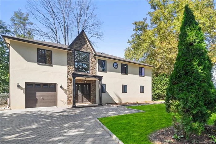 Welcome to this beautifully renovated home featuring a modern yet classic design with high-end finishes throughout. The spacious main level offers an inviting living area filled with natural light from new Anderson windows and a gourmet kitchen equipped with a gas stove and downdraft exhaust. Energy-efficient heat pumps ensure comfort year-round, while a tankless water heater provides endless hot water. Outside, the manicured yard and expansive deck create an ideal space for entertaining, and the one-car garage adds convenience and storage. Nestled in a desirable neighborhood, this colonial is more than just a house it&rsquo;s a place to call home, offering modern updates, timeless charm, and a location that&rsquo;s hard to beat. Don&rsquo;t miss the opportunity to make this your dream home! New Rochelle PO however you have the choice of Eastchester schools. 2 lots included in sale - .16 acres in Eastchester and .22 acres in New Rochelle.