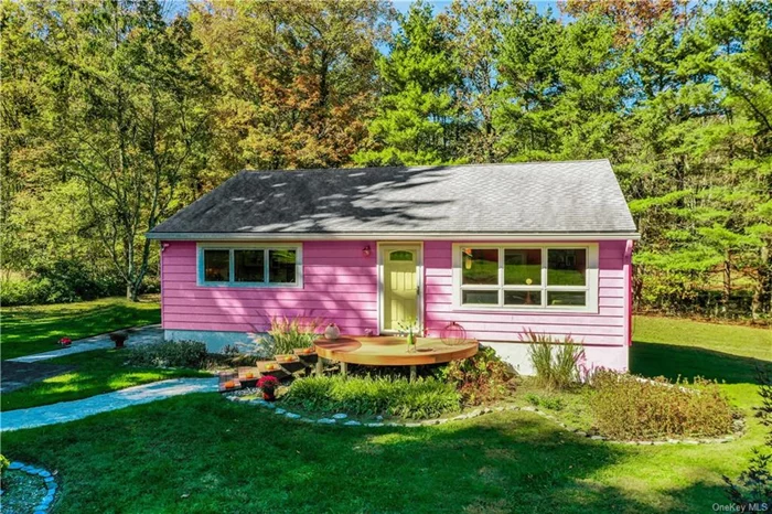 Welcome to this move-in-ready Mid-Century Ranch that exudes charm, character, and a cool retro vibe. With 1, 080 square feet of well designed space, this home feels surprisingly roomy and welcoming. The sunny open plan kitchen and living room is a standout, marrying the timeless flair of the 1950s with sleek updates, creating a space that&rsquo;s both vibrant and functional. The primary bedroom offers an unexpected touch of tranquility with its serene Asian-inspired aesthetic. Meanwhile, the newly renovated bathroom steals the show with a luxurious tiled shower and a bold red vanity that adds a pop of color and style. With central air, propane forced air heat, and on-demand hot water, every comfort has been considered. The home&rsquo;s newer roof, windows, and mechanicals ensure peace of mind, and the full basement, complete with a B-Dry system, provides an opportunity for extra storage or creative use. Set on a quiet, dead-end street, this 1.10-acre property feels like your own private retreat. Trees frame the yard, and a stream gently winds along the property, offering a soothing soundtrack to your daily life. It&rsquo;s the perfect balance of modern living and natural serenity. Schedule your showing today. P.S. Pink not your color, the aluminum siding is easily repainted :)