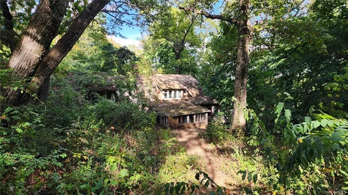 Unique opportunity to create your private mountaintop retreat. 1.25 wooded acres with a short walk to Lake Mahopac.