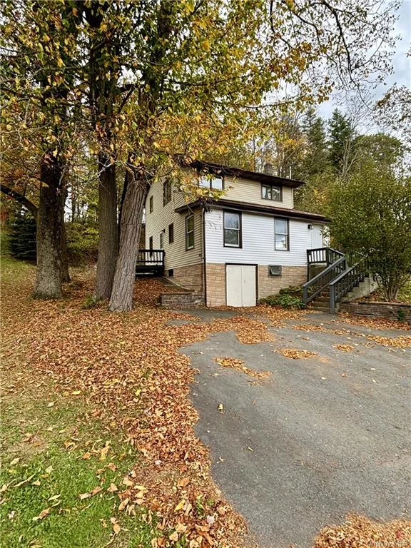 Sweet newly renovated 2 story modern farmhouse with open concept. Lovely great room consisting of LR, DR, good size kitchen on first floor all with new beautiful laminate floors.. Entry foyer, office space, terrific laundry room and pretty powder room welcome you home. Second floor has fabulous spacious bedroom with soaring cathedral ceilings and skylight for natural lighting. 2nd bedroom is also large with lots of light. Shared newly renovated full bath has lots of charm. Nice yard and plenty of parking in private driveway. Must see-great price.