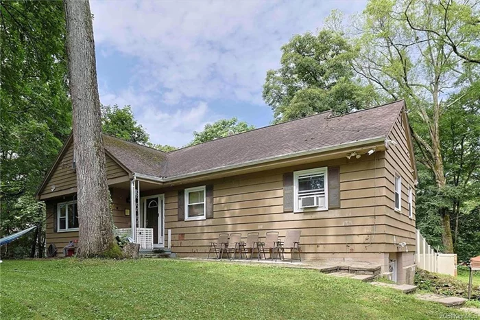 Privately tucked away, yet convenient to everything, this 4BR, 2.5 Bath Cape Cod on a corner lot in a quiet cul-de-sac, is waiting for someone with a little imagination and skills to give it some TLC to bring it back to its full potential! Enter up the stone steps which guide you to a foyer that opens into a spacious living room with a fireplace. Original hardwood floors and oversized picture windows offer great bones, and plenty of natural light. The dining room features sliding glass doors to the back porch and balcony, offering a glimpse of a sizable fenced-in backyard. The area is perfect for entertaining or gardening, or enjoying the around the above-ground pool, which is surrounded by a custom composite deck and seating area. The open kitchen offers a spacious layout with ample counter space and a center island and it&rsquo;s ready for a modern refresh. On the main floor, you&rsquo;ll find three bedrooms and 1.5 baths. The upper floor hosts a fourth, expansive bedroom with access to an unfinished attic space ideal for additional storage or a future renovation project. The walk-out finished basement provides flexible spaces, including a den/office, recreation room, and laundry room, along with a full bath - very convenient for coming in from the pool. Currently set up as a gym, it has previously served as a family room. The basement could use some cosmetic updates but offers great potential for a variety of uses. The attached garage is spacious, ready for some organizing and customization. You really can&rsquo;t beat the location - with endless shopping, dining, recreation, medical, educational and transportation options nearby. Perfect for the buyer looking to invest some sweat equity to make this classic Cape Cod home truly shine!