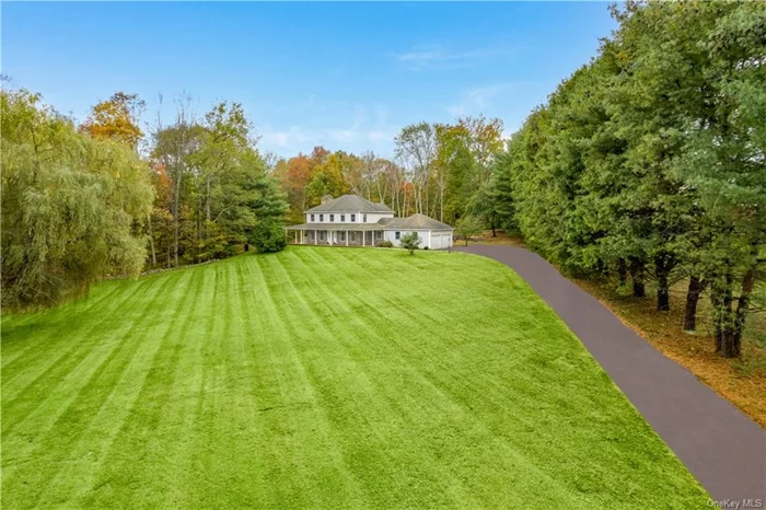 Following down the long tree lined driveway to a place you call HOME! Situated in the highly sought after Meadows development, in the heart of Pleasant Valley, Arlington Schools, perched up on over 3 acres, sits this Farmhouse Colonial with stunning Hudson Valley views! Walking down the Belgian block front path to your wrap-a-round rocking chair mahogany front porch, you cant help but notice the mature landscaping enveloped by mature trees offering total privacy, peace and relaxation. With over 3100 finished SQ FT of living space, 3 bedrooms, 3.5 baths, this house has ample space for all of your living needs. Home features oak flooring, freshly painted walls throughout, recessed lighting, central air, first floor laundry, spacious bonus room with wide plank flooring, oversized windows allowing ample natural light and 2 wood burning fireplaces. Upstairs you will find an expansive primary suite with his and hers closets, en suite bath with custom tile surround shower and jacuzzi tub. 2 other well size bedrooms, one with en suite full bathroom, and another full updated main bath. Fully finished lower level allows for a perfect gym/rec room/flex space and additional storage space. Exterior features in-ground pool with oversized patio with fence surround, and oversized 2 car attached garage. Excellent location, minutes to Taconic PKWY, villages of Pleasant Valley and Millbrook, downtown Poughkeepsie and the Train Station, Eastdale Village, culinary grade shopping, schools and more! **Some photos are virtually staged**