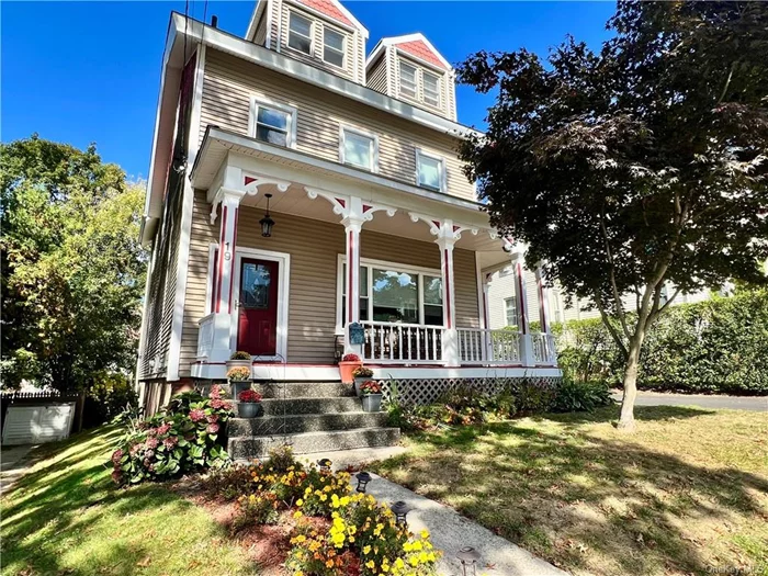 Vintage Village Colonial! Wonderful turn of the century home with just the right blend of maintaining the character of original architectural details and woodwork, combined with modern updates. Perfect for entertaining both inside and out! Sit on the wraparound front porch and enjoy the sunsets or entertain in the rear of the house on the expansive two-tier deck with gazebo, or gather round the fire pit. Inside, the formal living room and formal dining room are both spacious with high ceilings, and there is an updated full bath with bathtub on the first floor. The eat in kitchen boasts a large pantry closet, stainless appliances, a double oven, and a door to the deck. On the second floor, there are hardwood floors in two of the bedrooms, an updated bathroom, a laundry room, and another spacious bedroom. The walk-up finished attic provides great space for two additional rooms. The full unfinished basement with workshop and Bilko door has lots of storage space and an above ground oil tank. The extensive driveway allows parking for up to 6 cars. Walk to village, schools and metro north. This gem of a home is a beauty! There are no audio recording devices inside this property.