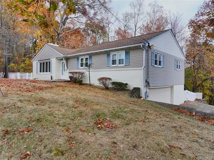 Discover this charming 2, 600 sq. ft. ranch house nestled in a tranquil neighborhood of New Windsor, NY. This delightful home features 3 spacious bedrooms and 3 recently updated bathrooms. As you enter, you are welcomed by a beautiful stone-faced fireplace in the living room, providing a cozy ambiance for gatherings. Nice size Kitchen with Quartz Counters. The home boasts a heated three-season room at the back, with walkout to a new Treks deck, ideal for enjoying the outdoors year-round. Step outside from the basement to find a large patio perfect for entertaining or relaxing. The property is complemented by a fenced-in backyard, ensuring privacy and safety. For added convenience, there is a one-car garage located under the house. This ranch is not only a serene retreat but also an ideal commuter location, situated near train stations, major highways, and Stewart International Airport. Don&rsquo;t miss the opportunity to make this beautiful home your own!