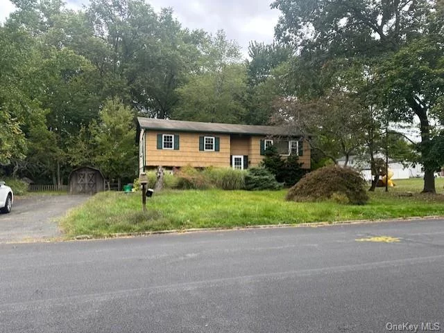 Welcome to 23 White Oak Lane, a spacious Bi-Level home featuring 5 bedrooms and 3.5 baths, nestled on a quiet street in the serene Nanuet neighborhood. This property offers ample space for family living, but it does require some TLC, including a new roof, boiler, and water heater. With its great potential and prime location, this home is an excellent opportunity for those looking to invest and make it their own. CASH ONLY