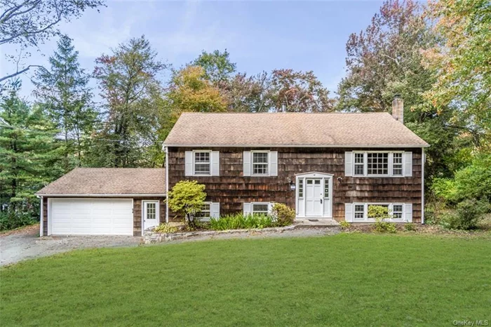 Welcome to this charming 4-bedroom, 2-bathroom home located in the Lake Lincolndale section of Somers, New York. This home boasts an open concept living room with gleaming wood floors that flow seamlessly into the dining room, perfect for family gatherings and entertaining. The eat-in kitchen is a chef&rsquo;s dream, featuring granite countertops, stainless steel appliances, and ample space for casual meals. Lower Level offers a spacious family room and a versatile den/office. Plenty of room for work, play, and relaxation. Perfect for guest an additional bedroom with full bath on lower level. Step out onto the upper-level deck to enjoy your morning coffee or evening sunsets, overlooking lush, .55-acre wooded property. This home comes with important upgrades, including an updated electrical panel, oil tank and heating system, ensuring comfort and efficiency year-round.  Conveniently located near parks, schools, and local amenities, this home provides a perfect blend of modern living in a tranquil setting. Don&rsquo;t miss out on making this Somers gem your new home!