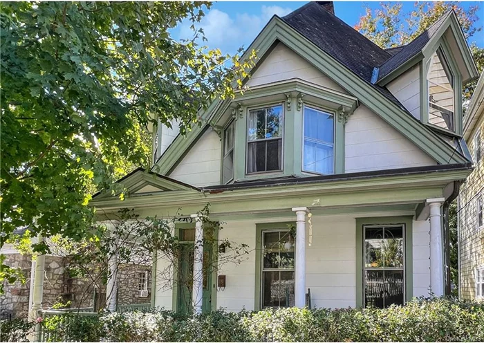 Historic Architectural Gem in prime Cold Spring Village location! This unique turn-of-the-century Victorian home features a front room with built-in library shelving, a sizable kitchen, ample dining room with a wonderful bay window, three gracious bedrooms featuring amazing corner dormers, original 1940s tile bath, and a walk-up finished vaulted attic space.. Enjoy the rocking chair wrap around porch or the solitude of the rear pergola-covered deck overlooking a private garden with raised beds, sitting areas and seasonal stream. The walkout basement includes office and workshop areas. Stylish details and appointments throughout. This is truly a one-of-a-kind home. Walk to shops, school, parks, trails, dining! Residential parking, Blue-Ribbon Haldane School District.