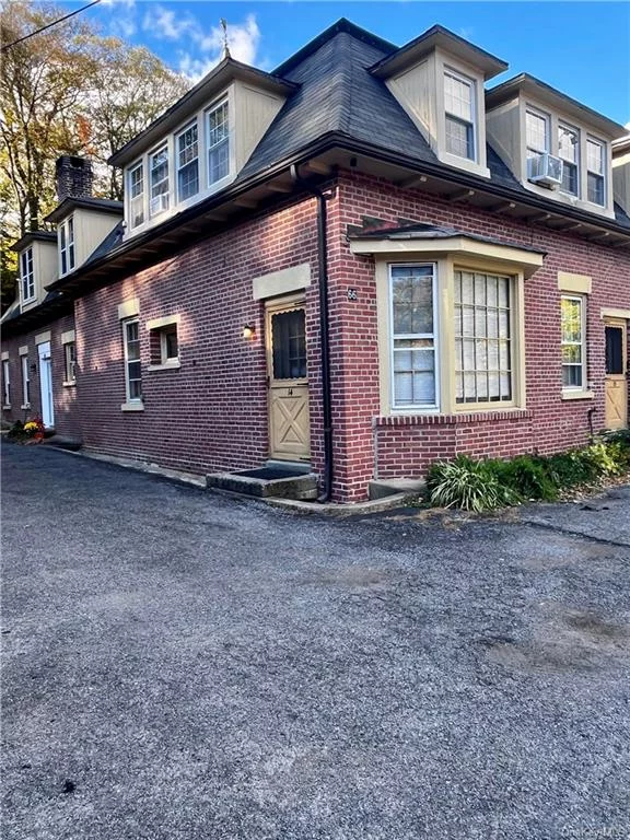 This quiet and sunny first floor apartment is located in the historic Carriage Houses of Fort Montgomery on the former JP Morgan estate. A perfect oasis with an abundance of closet and storage space, open concept kitchen and living room, queen size bedroom, ceiling fans, and off street parking. Close to Bear Mountain State Park, West Point, Woodbury Commons, and multiple train stations to New York City. No pets, and no smoking. Tenant pays for electric and cable/internet. Landlord requires an application with references, monthly income, full credit report, minimum credit score of 675, 1st months rent, equivalent of one month rent as security deposit, and equivalent of one month rent as brokerage commissions paid at lease signing. Immediate occupancy available and the possibility of the apartment being furnished by the landlord.