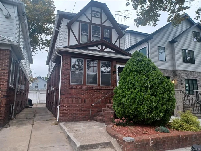 4 bedroom colonial located in the Midwood section of Brooklyn on a wide street. Spacious living room and dining room. Eat in Kitchen with lots of cabinets.. Hardwood floors except kitchen and baths. Large master bedroom with big closet. 3 additional bedrooms. Partially finished Basement has plumbing for additional bathroom and Kitchen. Could be created for extended family living with separate entrance. Shared Driveway. Garage and Yard. Convenient to transportation , shops , schools etc.