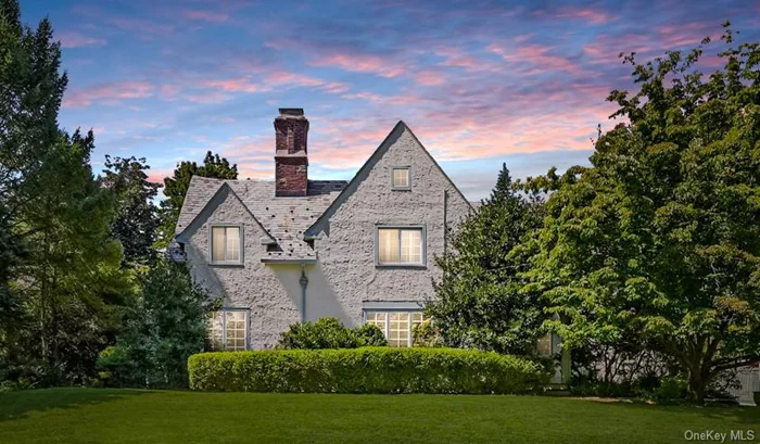 Nestled in the heart of Scarsdale&rsquo;s historic Cotswold district on a half of acre of land, this charming Tudor-style home offers a perfect blend of modern comfort and timeless elegance. Just a stone&rsquo;s throw from desirable Scarsdale village and Metro North station, convenience meets tranquility in this bright and airy abode. Step inside to discover gleaming hardwood floors and an abundance of natural light streaming through numerous windows and skylights. The inviting entry foyer leads to a formal living room, complete with a cozy fireplace perfect for those chilly evenings. Be delighted by the den or library, featuring custom-built shelves for your literary treasures. The oversized formal dining room sets the stage for memorable gatherings, while the eat-in kitchen boasts cherry cabinets that add warmth to the heart of the home. The piece de resistance? A spacious family room with vaulted ceilings and French doors that open onto a generous patio, beckoning you to enjoy the outdoors. Ascend to the second floor, where you&rsquo;ll find two sizable bedrooms and a full hall bathroom. The primary suite is a true retreat, featuring a dreamy en-suite bathroom and an additional room ideal for a nursery or home office. Need more space? The walk-up attic provides ample storage for all your seasonal decor and cherished mementos. Outside, prepare to be enchanted by your private oasis with lush plantings. Set back from the street, this home offers a serene escape. The large patio leads to a hidden treasure  a spacious in-ground pool with ample privacy and perfectly situated for everyday living and entertaining. With its proximity to top-rated Edgemont schools, and easy access to public transportation, this home truly offers the best of suburban living. Don&rsquo;t miss your chance to make this modernized Tudor your own slice of Scarsdale paradise!