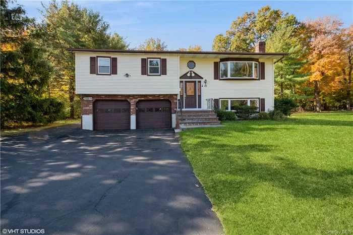 Well maintained expanded 4 bedroom, 3 full bath home in sought after Blauvelt neighborhood on over 1/2 acre. Family room addition on upper level with vaulted ceiling, high hats and access to deck. Primary bedroom has en-suite. Solid wood doors on upper level along with hardwood floors. Another extension on the lower level make this home ideal for extended family or just more space. Lower level has 2 family rooms, bedroom, full bath, gas/brick fireplace and access to spacious back yard. 2 car garage and central a/c.