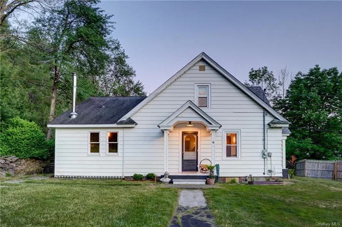 Introducing Highland Cottage, a charming 1938 cottage that retains details of the fine craftsmanship indicative of the period. Original wood trim and doors tell of time when wood materials were just superior to today&rsquo;s. The user-friendly layout is still perfectly compatible with contemporary lifestyles. The spacious kitchen was renovated in 2023. A large island adds additional workspace to the butcher block counter tops. New cabinets and tiled backsplash finish off the renovation. The pass-through window has a pair of stools for a morning bite and a coffee, or for an informal meal on the go. On the other side of the kitchen is one of the two living rooms or dens. The wood stove will fill the room with warmth, even in the coldest of winters. The laid-up stone hearth acts as a radiant heat source. There is a washer and dryer and, just beyond, an exterior door to screen-in porch for outdoor dining in the warmer months. The electrical service and panel are new. On the opposite side of the kitchen is a separate dining room which is ideal for jovial dinners with family and friends. The lovely original wood floors run through there and onwards to the den, or second living room. Here there are several options, keep it as a cozy TV room hangout, or create an overflow bedroom or home office. The main floor bedroom can accommodate a king size bed and has easy access to the bathroom. Head upstairs to the other two roomy bedrooms. There are closets in each and have numerous possibilities. The yard is fenced in and there is a fire pit for summer s&rsquo;mores. Most of the 1.6 acres is a wooded area behind the house. Barryville is only 7 minutes away, where there is a great farmer&rsquo;s market on Saturdays and easy access to the Delaware River. Narrowsburg is just 18 minutes away, and there is a grocery store just 5 minutes away in Eldred.