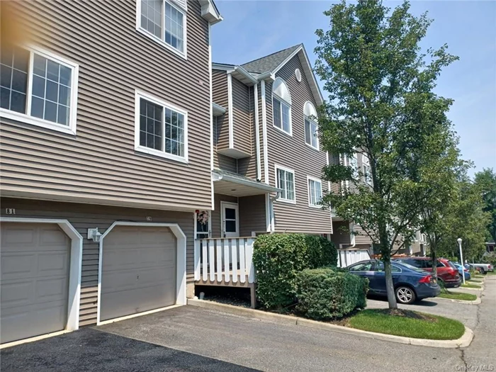 Renovated spacious condominium. All new flooring throughout, No carpet! Updated kitchen with Granite countertops and stainless steel appliances. Laundry on main level. Private Deck. One car garage. Close to shopping, transportation and parkways.