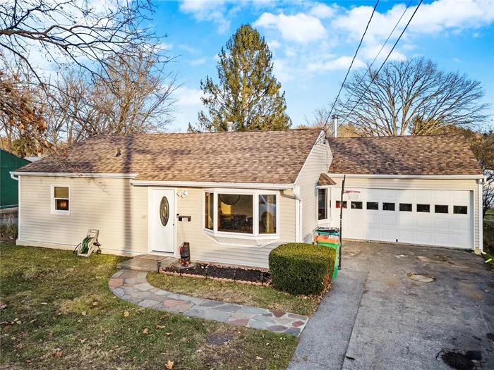 Turn Key Move In Ready! Updated galley kitchen with new cabinets, granite counters, and stainless steel appliances. The living room features two bay windows, bringing in great natural light. The family room offers a welcoming space for everyone to gather, with sliding glass doors that open to a level, fenced backyard with a recently replaced patio. An attached oversized two-car garage with a new door and automatic opener provides convenient access to the house through the family room. The roof was recently replaced, and the freshly painted interior and new siding add to the home&rsquo;s appeal. Enjoy the convenience of town water and sewer. Great location close to schools, shopping, restaurants, Marist College, and the hospital.