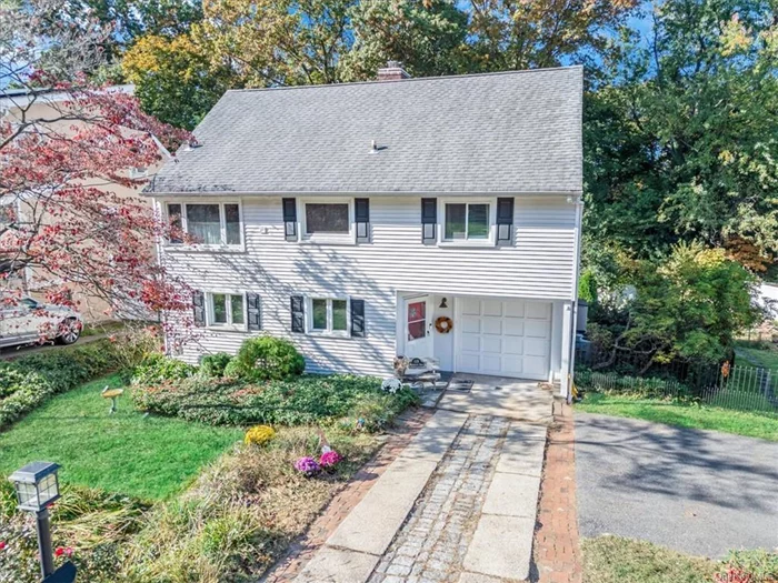 Welcome to this beautifully renovated home in the desirable Homefield section of Yonkers. Situated on an oversized lot, this meticulously maintained house features 3 bedrooms, 2 full baths, an open-concept living and dining area, a spacious family room, a modern kitchen, and a sun-filled office. The functional fireplace adds warmth and charm, while the easily accessible attic provides ample storage. Step outside to enjoy a large deck and patio, ideal for summer barbecues or relaxing evenings, all overlooking an expansive backyard. With a garage, driveway, and an additional paved area, there&rsquo;s plenty of parking space for family and guests. Nestled in a quiet, friendly neighborhood with easy access to parks, schools, shopping, and major highways, this home offers the perfect blend of comfort and style.