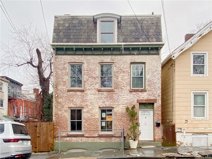 Fully renovated all brick federal style freestanding single-family home in the heart of Newburgh. The house spares no details, including a Reform Copenhagen kitchen, Top of line appliances from Bosch, and newly renovated bathrooms. A new, full laundry room with a washer and dryer. 10 white pine floors throughout, large backyard, original slate roof. brand new Anderson wood windows. This house is a must see and wont last long. This four-bedroom, two-bath, 2500-square-foot home is 2 blocks from Liberty Street and a short distance to the riverwalk and ferry to Beacon.