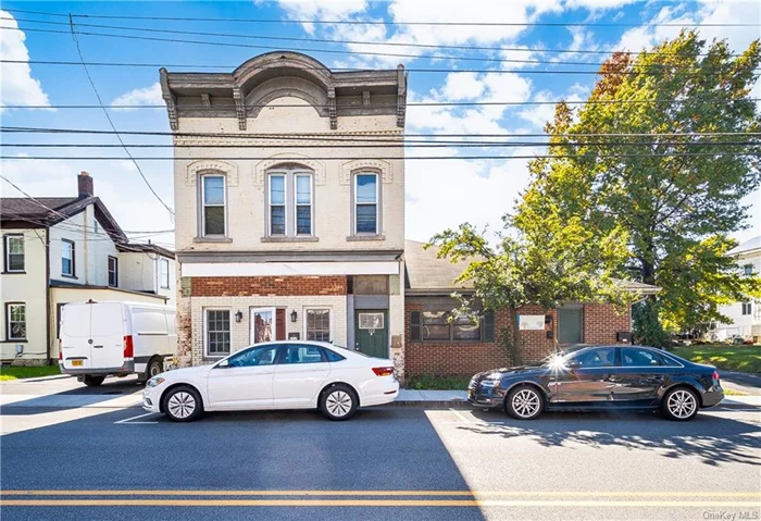 Fantastic mix use building in bustling downtown Middletown! This 3 unit property has 2 residential units and a commercial retail or office space and ample rear parking. This high visibility property offers plenty of opportunity to add additional value. With many updates to the residential units, and established tenancies, this is your chance to start or expand your portfolio.