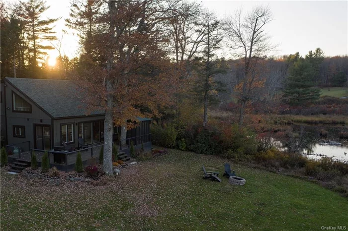 Tucked away at the end of a quiet dead-end road, this waterfront gem in Parksville, NY is your ultimate private escape. Perched on the shores of a large swimming and boating pond, complete with your own private dock, it&rsquo;s a rare find for both nature lovers and water enthusiasts who want it all without the crowds. Freshly gut-renovated from top to bottom and under 2 hours from NYC, the hot tub and outdoor shower are just icing on the cake. As you approach this enticing retreat, you&rsquo;ll spot the wraparound deck, hot tub, outdoor shower, and screened-in porch perfect for year-round entertaining or just pretending you&rsquo;re too busy to leave. Step through the large sliding glass doors to be greeted by sky-high ceilings in the kitchen and dining area, fitted with Bertazzoni appliances, sleek custom cabinets, and a dramatic woodstove fireplace hearth. Sip, dine, and cozy up while gazing out at Cranberry Pond a pristine, crystal-clear, spring-fed swimming and boating paradise. Also on the first floor: a cozy TV den (or office for when you must), a first-floor bedroom with direct access to the hot tub and outdoor shower (because why not?), and a convenient laundry room. Upstairs, two more bedrooms share a Jack-and-Jill, spa-worthy modern bathroom. Each bedroom offers plenty of closet space and large windows that let in all the light and stunning views you could ask for. Not to be missed: everything here is brand new roof, windows, doors, water heater, appliances, septic, and well. Relax in the luxurious modern bathrooms, unwind on the spacious deck, and take in the lush landscaping that frames this peaceful, private setting. Whether you&rsquo;re enjoying your morning coffee by the private pond or hosting a sunset dinner party, this house blends comfort and style with serious ease. Parksville&rsquo;s prime location just minutes from Livingston Manor keeps you close to the area&rsquo;s best spots, from dining and drinks at Main Street Farm, the DeBruce, Sunshine Colony, Upward Brewing, and The Kaatskeller, to cultural jaunts at Catskill Art Space. For adventure seekers, you&rsquo;re minutes from hiking at Mongaup State Park and Willowemoc Wild Forest, plus a quick drive to Roscoe&rsquo;s breweries and Bethel Woods Center for the Arts. Secluded but near everything, you get the best of both worlds. Ideal for year-round living or the perfect weekend escape, this is your chance to experience luxury, tranquility, and adventure all in one.