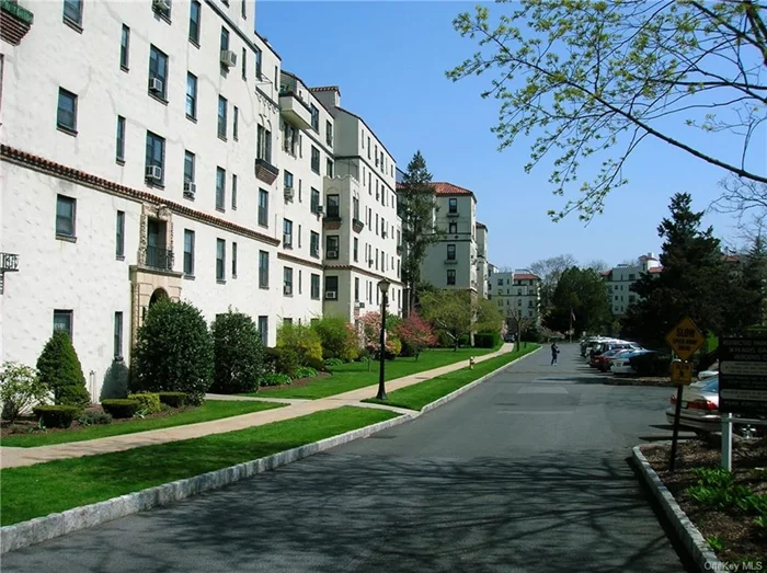 One of Wykagyl Gardens largest apartments in a stately pre-way building, set back from the roadway in a beautifully landscaped park like atmosphere. This remodeled 3 bedroom, 3 bath apartment boasts TWO fireplaces (one in living room, one in formal dining room), original oak floors throughout, terrace with golf course views, three remodeled bathrooms, and new kitchen with stainless appliances and granite counter tops. this home affords a comfortable and convenient lifestyle, close to both the Harlem and New Haven divisions of Metro North. Off street parking is offered at not charge. Wait list for outdoor/indoor reserved parking at $70/month and $100/month respectively. THIS IS A NON SMOKING PROPERTY