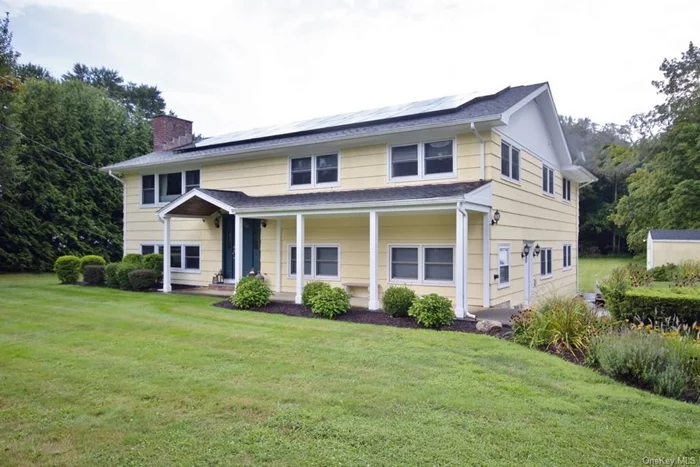 Move right into this completely renovated home with legal accessory apartment on parklike property! The main house has a beautiful eat in kitchen with Corian counters, stainless appliances, undercabinet lighting, pantry closet and maple cabinetry. Fireplace in living room, and dining room has sliding door to expansive rear deck. Primary bedroom suite has a fabulous, updated bathroom tumbled and travertine marble, along with an oversized shower. Three additional bedrooms and another updated bath, which includes a stackable washer/dryer. Lower-level family room has side door to the lengthy driveway. Hardwood floors, recessed lighting, updated energy efficient boiler & hot water heater, and new roof with solar panels. Buyer must apply for permit for accessory apartment, which has 3 bedrooms, living/dining room, updated kitchen and bath, and a covered patio. This is a rare find! There are no audio recording devices inside this property.