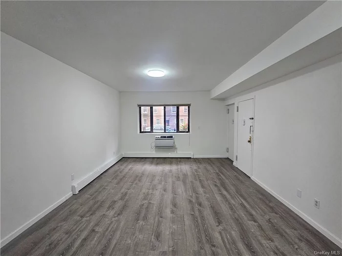 Welcome to the heart of Woodside. This affordable studio features new flooring, a kitchenette with new cabinetry, full bath and bow style windows offering an abundance of natural light. Conveniently located 1 block from shops, stores, laundromat, and restaurants on Queens Blvd and just a short walk to the subway, all the basics are covered.