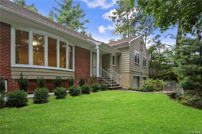 Bright and refined five-bedroom, three-and-one-half bath brick and clapboard Split Level home captures the essence of modern living. Open floor plan with impeccable finishes throughout make living easy and entertaining a pleasure. Step into the entrance area with powder room and on to the spacious living room with fireplace. The beautiful, modern kitchen features white cabinetry, quartz counters, stainless steel appliances, a breakfast peninsula and is open to the dining room. The first floor is completed with a family room and sliding glass doors to the patio. Several steps to the bedroom levels with the primary bedroom with en-suite bath, bedroom, hall bath, bedroom, and up to the next bedroom level with hall bath, bedroom and en-suite bedroom or office. Home network: CAT 6 and RG6 quad shield to all rooms. Gigabit Ethernet switch included for fast and stable work connection from home. All freshly appointed and easy walk to town, train, tennis, high school and park. Truly a move-in ready home. All photos taken while house was empty, prior to current tenants taking occupancy.