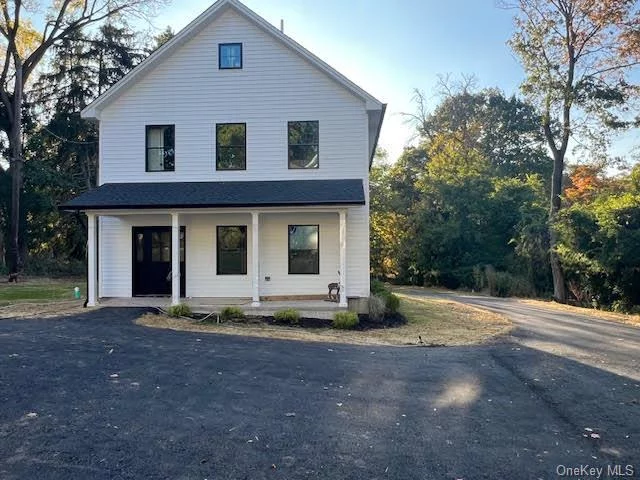 Simply STUNNING! NEW CONSTRUCTION! NEVER lived in. Sun-kissed three bedroom, 2.5 bath home in the heart of Blauvelt. Sitting privately on a beautiful country road sits this gorgeous colonial home featuring hardwood floors throughout, 9 ft. ceilings, recessed lighting, chef;s kitchen w/stainless steel appliances, quartz countertops, center island, great cabinet space w/ crown moldings, lovely subway glass tile backsplash, laundry room on the main floor, fabulous pantry and half bath off kitchen and sliders off kitchen leads to beautiful trex deck overlooking lush yard. Travel upstairs where you will enjoy a stunning master bedroom with walk in closet and luxurious bath with shower, two other large, sunfilled bedrooms and large full bath with tub. This home has so much and its just waiting for you. Don&rsquo;t miss this one!