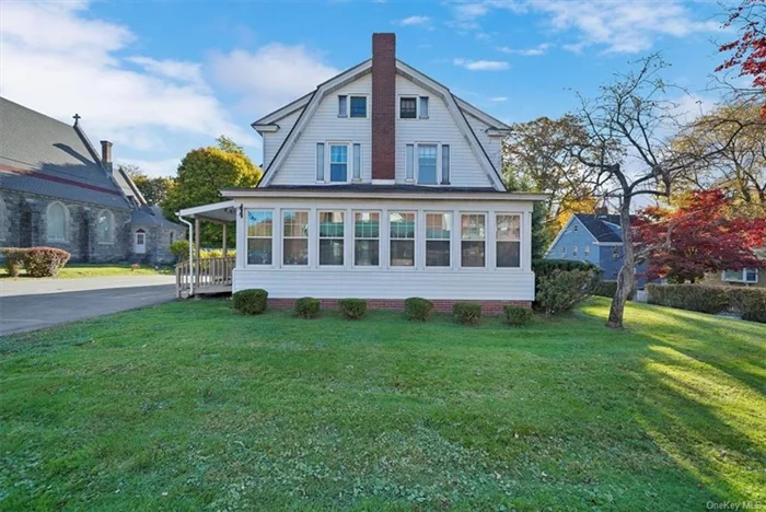 Centrally located in the Village of Monticello, this spacious two-story Colonial has previously been used as a law office. The home features a dining room and a living room with a fireplace, which served as a conference room. Hardwood flooring is present throughout the home, including beneath the carpet in the bedrooms, hallway, and stairs. Beautiful wood trim and ceiling beams enhance the main floor&rsquo;s aesthetic. The staircase leads to the upper level, which includes four bedrooms and a full bathroom; these bedrooms were formerly utilized as offices. This property is conveniently situated near local shopping, schools, and the highway.