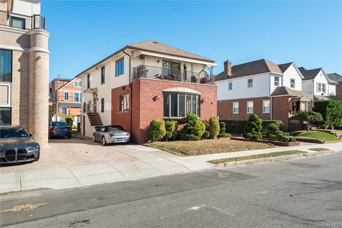 Detached two-family home just steps from the Manhattan Beach shoreline! This legal 2-family property sits on a spacious 60 x 100 lot. The first floor features a welcoming 2-bedroom, 1-bath apartment with a large living room, kitchen, and dining area, opening to an outdoor terrace. Radiant heated floors add comfort, with direct access to the finished cellar, which includes a recreation room, additional bathroom, mechanical rooms, and a laundry room ideal for entertainment and storage. The second-floor apartment is 1, 238 sq. ft. and offers 2 bedrooms, 1 bath, a living room, kitchen, and dining area perfect for personal use or rental income. Additional highlights include two private driveways and a 400-square-foot garage, providing ample parking and storage. A roof installed just two years ago ensures durability. This 2 family home offers a serene beachside lifestyle with rental income potential an opportunity not to be missed in one of Brooklyn&rsquo;s most desirable neighborhoods!