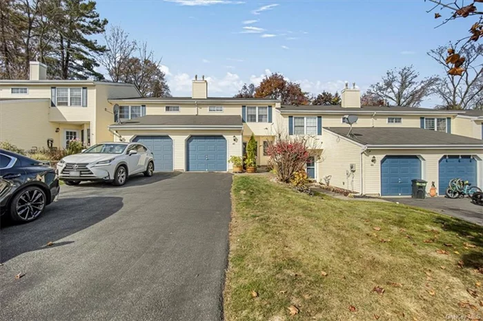 Welcome to the charm of maintenance-free living in the desirable Winding Brook community! This spacious 2-bedroom, 2.5-bathroom townhome offers a beautifully updated, move-in-ready experience. Enter through a bright and welcoming foyer featuring custom built-in seating with convenient storage. The home boasts new tile flooring throughout, adding a fresh, modern feel. The oversized galley kitchen is well-appointed with abundant cabinet and countertop space, a stylish tiled backsplash, and a cozy breakfast nook. The open-concept living and dining area flows seamlessly to sliding glass doors, opening to a private patio with garden bed planters ideal for vegetable gardening or relaxing outdoors. Upstairs, you&rsquo;ll find two generously sized bedrooms. The primary suite offers a spacious walk-in closet and an en-suite bath, while down the hall, the second bedroom is equally roomy and adjacent to another updated bathroom. All bathrooms have been recently remodeled with new vanities, lighting, and fixtures. A convenient powder room and full-sized garage complete this lovely home.  Enjoy the array of community amenities, including a pool, tennis courts, playground, and basketball courts. Don&rsquo;t miss the opportunity to make this your new home for the holidays!