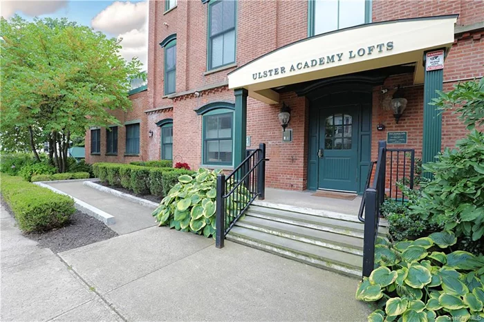 Rare opportunity to live in Kingston&rsquo;s beautiful Ulster Academy Lofts. Originally built in 1870, this building was once the largest school in Ulster County. In 2005, it was fully renovated into condominiums. This is a first floor unit, measuring over 1, 400 square feet. Open living area concept with 10ft ceiling height and wide doorways. It has a large den that can easily be used as a second bedroom, guest room or home office. Plenty of natural light throughout. In addition to everything this unit has to offer there is also off-street parking, and an elevator to the shared rooftop deck!