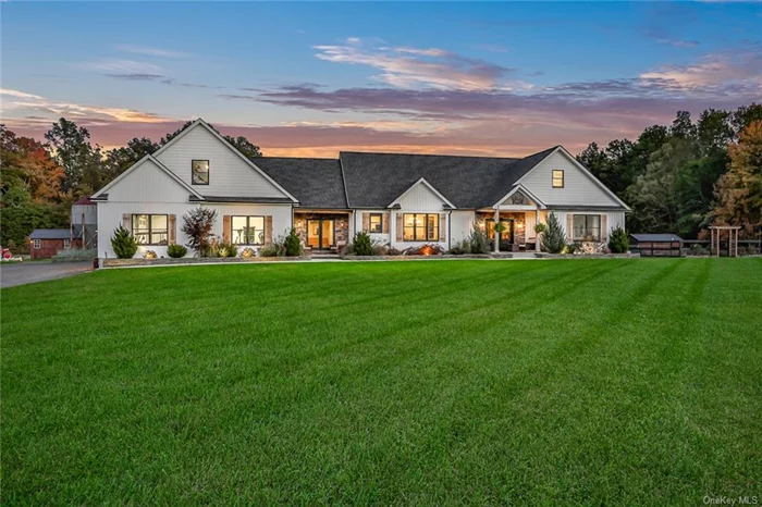 Welcome to this exquisite 3, 029-square-foot ranch-style farmhouse, where modern luxury meets timeless rural charm. Situated on a sprawling 28-acre parcel, this newer construction is designed with every detail carefully crafted to provide an ideal lifestyle for those seeking both elegance and comfort. Surrounded by lush, fenced-in fields, this property is not only an entertainer&rsquo;s dream but also a sanctuary for animal lovers and those who yearn for a peaceful countryside retreat. Upon arrival, guests are greeted by a grand double-door entry that opens into a massive foyer, setting the stage for the impressive design and spacious layout within. Soaring ceilings and oversized windows bathe each room in natural light, creating an airy, open feel. The home&rsquo;s thoughtful design combines openness with intimate spaces, making it perfect for both relaxed family life and entertaining on any scale. At the heart of this home is the designer kitchen, a chef&rsquo;s paradise complete with top-of-the-line stainless steel appliances, Quarts counters, custom inset cabinets, and a large center island ideal for meal prep and casual dining.This space is as practical as it is beautiful, with a walk-in pantry offering abundant shelving and storage, and a huge mudroom nearby to keep the flow between indoor and outdoor activities smooth and tidy. The living room, centered around a stone fireplace, is perfect for cozy nights and gatherings alike, with open views of the surrounding landscape that further emphasize the home&rsquo;s harmonious connection to its environment. Nine-foot-tall doors throughout the home enhance the feeling of grandeur, while the oversized windows ensure that every room is filled with an abundance of natural light, creating a warm and welcoming atmosphere. The primary suite is a true retreat,  a private balcony that offers sweeping views of the property. Spacious and luxurious, the suite includes a large walk-in closet designed to accommodate any wardrobe and a spa-like bathroom with premium finishes & a custom shower, this en suite bath provides a space to recharge. The additional bedrooms are generously sized, perfect for family members or guests, ensuring that everyone enjoys a comfortable and inviting space to call their own. In addition to the beautifully designed indoor spaces, this home offers extensive outdoor amenities that make it perfect for entertaining and enjoying country life to its fullest. Step outside to find a 20 by 30-foot pavilion designed with every convenience in mind. Equipped with an outdoor bar, fridge, sink, side burners, tv&rsquo;s and ample counter space, this pavilion is the ideal spot for hosting barbecues, family gatherings, or simply relaxing under the stars. The stamped concrete patios and surrounding walkways blend seamlessly with the lighted landscape, enhancing the outdoor areas without overpowering the natural beauty of the surroundings. This property&rsquo;s appeal extends beyond its stunning home and entertaining spaces. For those with a passion for animals or farming, the property includes a 10 by 20-foot run-in shelter, a 10 by 20-foot shed, and a larger 12 by 24-foot shed that serves dual purposes, with one half designated for feed storage and the other as additional shelter. Approx 7 acres of property is fenced with both traditional and electric fencing, providing flexibility and security for a variety of animals. With zoning that allows for cows or horses, and an active hayfield to support agricultural pursuits, this property is ideally suited for those who wish to enjoy an active rural lifestyle. Constructed with the utmost quality, this home was built to last. Spray foam insulation ensures energy efficiency, while central air conditioning keeps the home comfortable year-round. The attached three-car garage spans 1, 450 square feet, offering more than enough room for vehicles, tools, and recreational equipment. Every aspect of this property has been designed for durability, comfort, and ease of use. This ranch-style farmhouse embodies the best of both worlds. It offers the serenity of rural life with the luxury and sophistication of a modern, high-end home. Whether you&rsquo;re enjoying quiet moments in the spacious master suite, hosting friends and family in the pavilion, or simply taking in the beauty of your 28 acres from one of the many outdoor seating areas, this property provides an unmatched living experience. With ample parking, open spaces, and an environment perfect for animals, this hom