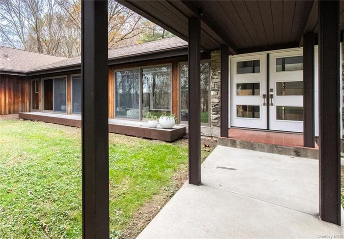 Open House Sunday, Nov 3rd 1-4:00pm Welcome to this exceptional mid-century modern retreat, once a working farm home to over 100 sheep, now transformed into an architectural gem designed by the late Charles J. Cooke. Nestled atop 12 serene acres with flowing streams and pastures, this residence offers unparalleled privacy amidst mature trees and a naturalized landscape. The home&rsquo;s design seamlessly integrates with its surroundings, featuring expansive glass walls and transoms that invite natural light into every space. Inside, the thoughtful blend of tradition and modern elements shines, from handpicked stone from the property used in the accent walls and fireplaces to the airy, open floor plan that flows effortlessly for entertaining. Upon entry, a corridor gallery flanked by a light-filled orangery&#160;leads to a generously sized living room with high ceilings and walls of glass. The one-level layout offers ease and elegance, highlighted by a cozy den with a striking fireplace, a primary suite with walk-in closets, &#160;an updated quartz bathroom, and spacious additional bedrooms. The heart of the home is the open-concept kitchen and great room, where a stone fireplace and large windows create a welcoming, bright atmosphere perfect for culinary gatherings or casual relaxation.&#160; The large utility barn has electricity and is ideal for specialty cars, livestock, equipment shed, or studio space. Whether looking for a peaceful retreat or an entertainer&rsquo;s paradise, this property perfectly combines modern design, natural beauty, and timeless comfort. It is just minutes from the Taconic State Parkway and less than 1 1/2 hours from New York City. Close to hiking&#160;and biking trails&#160;and convenient to shopping.