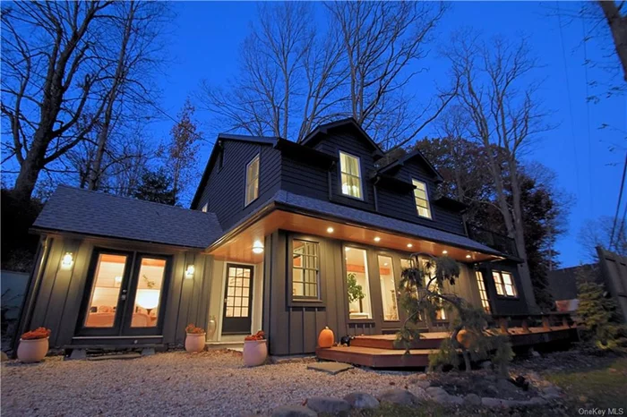 Welcome to your dream retreat in the heart of the Catskill Mountains! This beautifully remodeled 5-bedroom, 3-bathroom home in Woodstock, NY, sits on 3.6 private acres with breathtaking mountain views that bring a sense of tranquility and calm. Every inch of this property has been carefully upgraded with the highest attention to detail even the doors to each room are custom, featuring fogged glass panels for added elegance. This home has a proven Airbnb history, making it a perfect investment or weekend escape. On the main floor, you&rsquo;ll find two inviting bedrooms one with a cathedral ceiling adorned with wood inlays, and another bathed in natural light with direct access to the primary marble-lined bathroom. The open-concept living area is centered around a wood-burning fireplace, seamlessly connecting to the spacious kitchen, which makes it ideal for both peaceful evenings and lively gatherings. Upstairs, you&rsquo;ll discover two more bedrooms, plus a versatile room that&rsquo;s perfect for an office, media area, or music studio. This room adjoins a sunroom with access to a terrace offering expansive mountain views. You&rsquo;ll also find a thoughtfully placed wet bar! The luxurious upstairs bathroom includes a soaking tub and marble finishes for ultimate relaxation. Outdoors, a new deck and seating area with a firepit create the perfect setting for enjoying evenings under the stars, hosting friends, or soaking up the peace of nature. Minutes from Woodstock&rsquo;s vibrant village scene with fine dining, arts, and culture, this home is truly a Catskills gem infused with heart and soul.